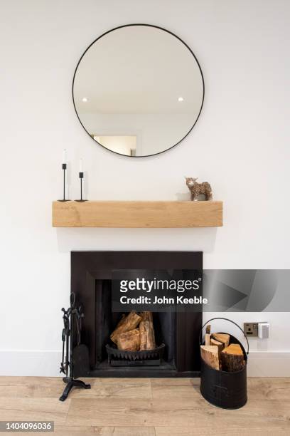 property lounge fireplace interiors - mantel stock pictures, royalty-free photos & images