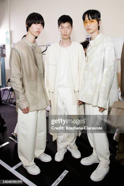 Models pose in the backstage at the Zegna fashion show during the Milan Fashion Week S/S 2023 on June 20, 2022 in Milan, Italy.
