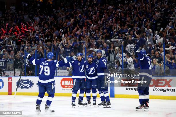 Nicholas Paul of the Tampa Bay Lightning celebrates with teammates after scoring a goal during the second period against the Colorado Avalanche in...