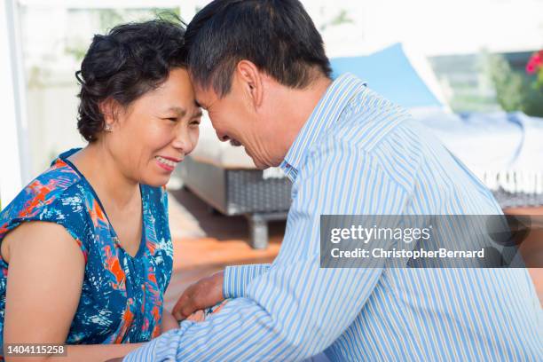 happy senior couple summer portrait - vietnamese people stock pictures, royalty-free photos & images