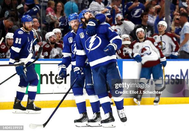 Pat Maroon of the Tampa Bay Lightning celebrates his goal against the Colorado Avalanche with teammate Steven Stamkos during the second period Game...