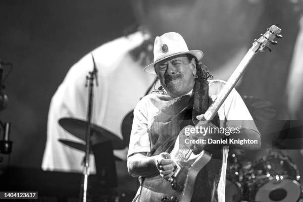 Guitarist Carlos Santana of Santana performs on stage at North Island Credit Union Amphitheatre on June 17, 2022 in Chula Vista, California.