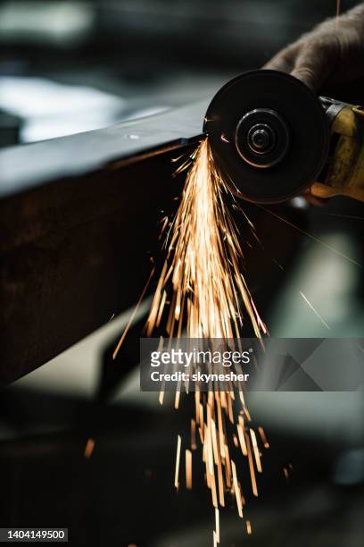 close up of cutting metal with electric saw. - welding stock pictures, royalty-free photos & images