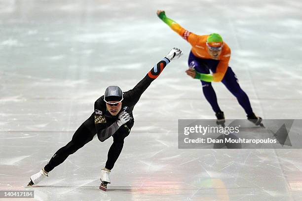 Tucker Fredricks of USA and Jan Smeekens of Netherlands compete in the Division A 1st 500m mens on Day One of the Essent ISU World Cup Speed Skating...