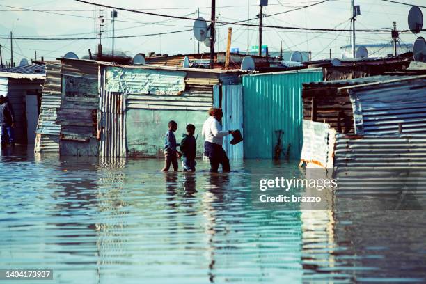 flooded shack homes - slum stock pictures, royalty-free photos & images