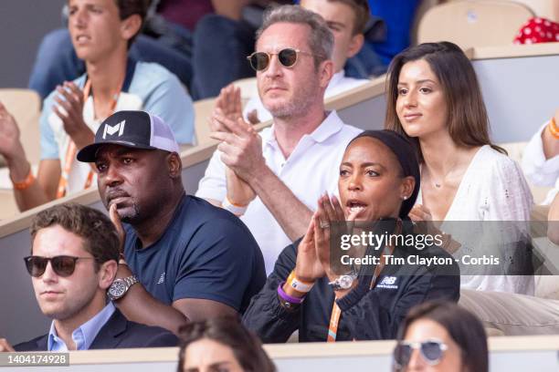 Candi Gauff, and Corey Gauff, parents of Coco Gauff of the United States react during her match against Martina Trevisan of Italy during her victory...