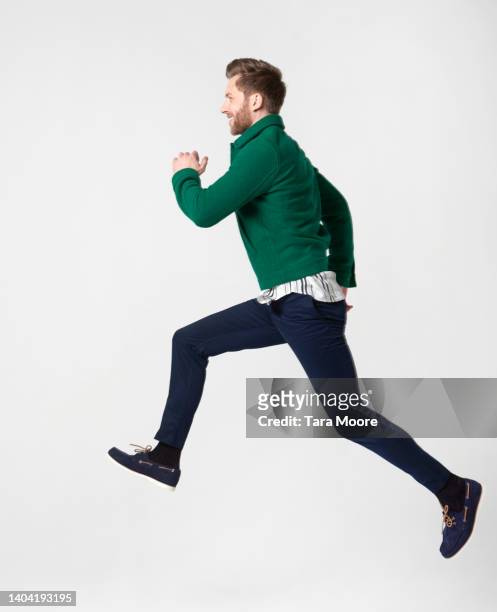 man running - people jumping stock-fotos und bilder