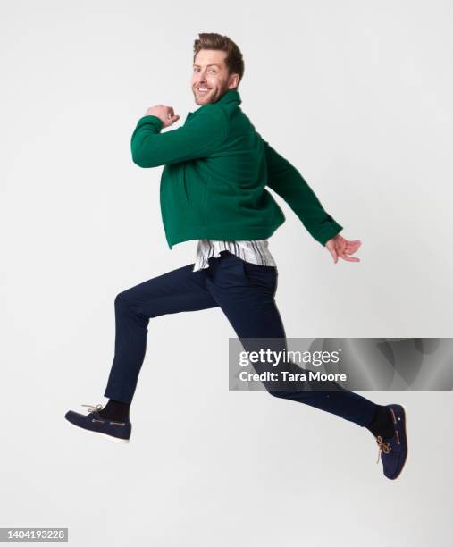 man running - jumping stock pictures, royalty-free photos & images