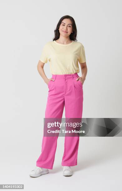 woman looking to camera - woman facing camera full body stock pictures, royalty-free photos & images