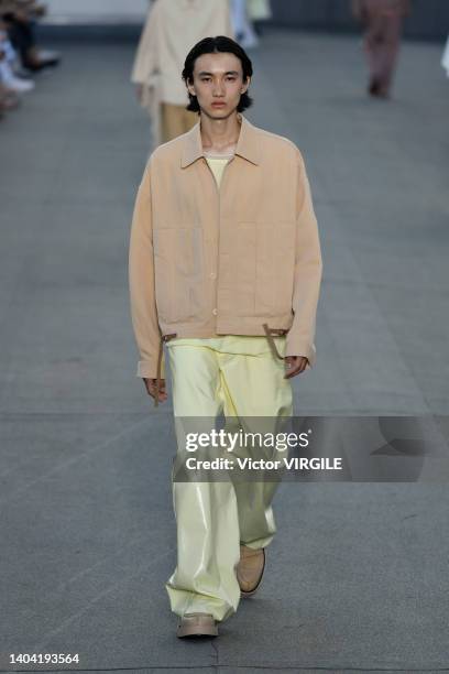 Model walks the runway during the Zegna Ready to Wear Spring/Summer 2023 fashion show as part of the Milan Men Fashion Week on June 20, 2022 in...