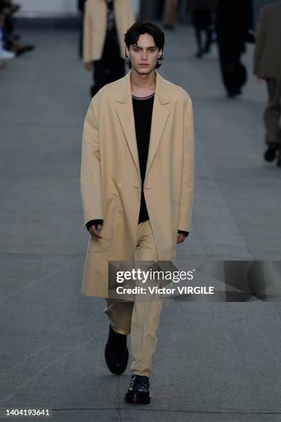 Model walks the runway during the Zegna Ready to Wear Spring/Summer 2023 fashion show as part of the Milan Men Fashion Week on June 20, 2022 in...