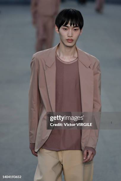 Model walks the runway during the Zegna Ready to Wear Spring/Summer 2023 fashion show as part of the Milan Men Fashion Week on June 20, 2022 in...