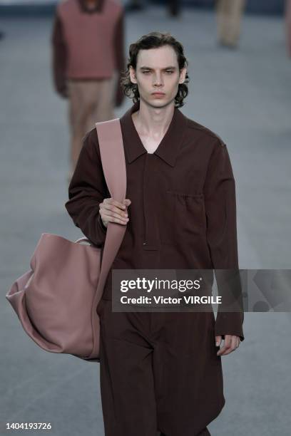 Model walks the runway during the Zegna Ready to Wear Spring/Summer 2023 fashion show as part of the Milan Men Fashion Week on June 20, 2022 in...