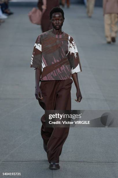 Model walks the runway during the Zegna Ready to Wear Spring/Summer 2023 fashion show as part of the Milan Men Fashion Week on June 20, 2022 in...