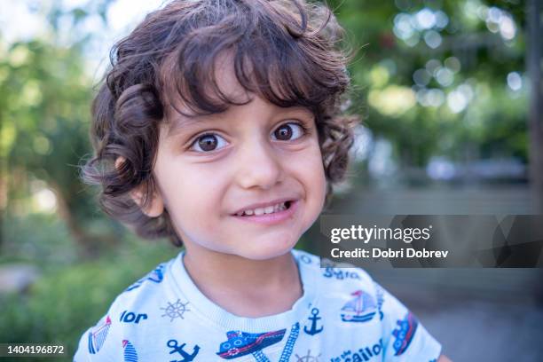 boy looking at camera - brown eyes stock pictures, royalty-free photos & images