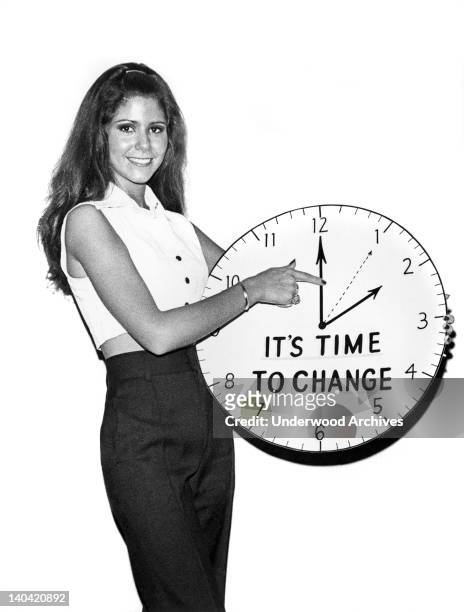Reminder to change clocks back from day light savings time in the fall, Brooklyn, New York circa 1964.