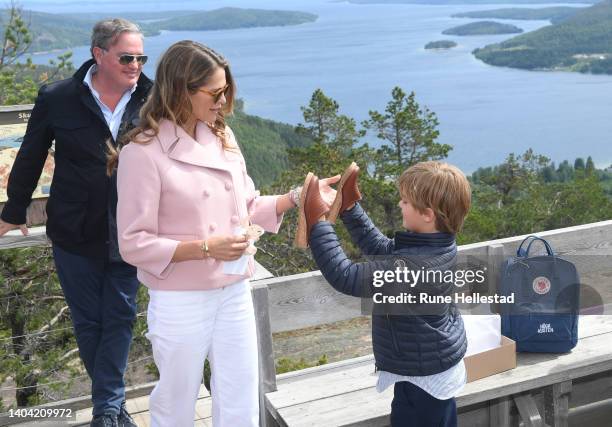 Prince Nicolas of Sweden, Princess Madeleine of Sweden and Chris O'Neill visit Skuleberget on June 21, 2022 in Skuleberget, Sweden.