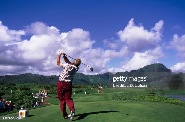 John Daly from the United States follows his drive off the tee during the PGA Mastercard Grand Slam of Golf tournament on 7th November 1995 at the...