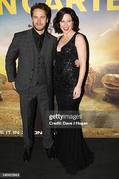 Taylor Kitsch and Lynn Collins attend the UK premiere of John Carter at The BFI Southbank on March 1, 2012 in London, England.