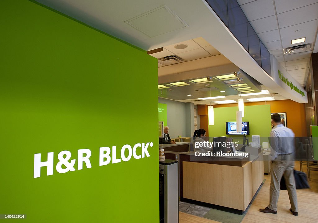 H R Block Services A customer speaks to a receptionist at the H&R Block Inc. flagship ...