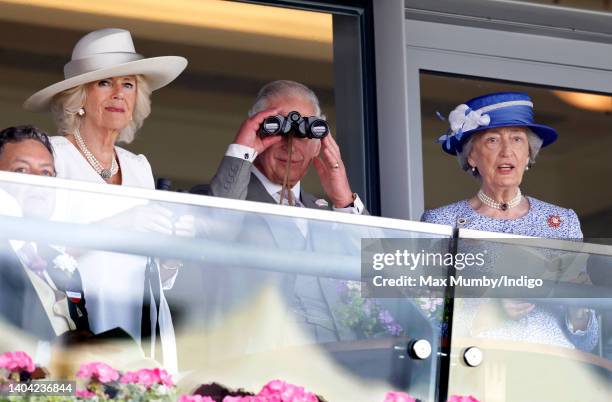 Camilla, Duchess of Cornwall, Prince Charles, Prince of Wales and Lady Susan Hussey watch the racing as they attend day 2 of Royal Ascot at Ascot...