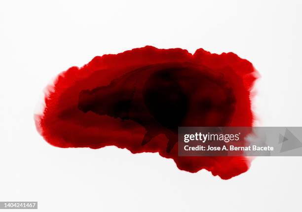 full frame of splashes and drops of red liquid in the form of blood, on a white background. - blob stock-fotos und bilder