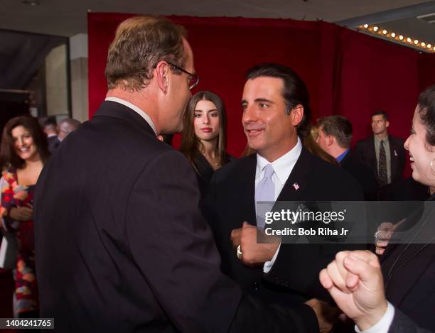 Andy Garcia and Kelsey Grammer greet each other as they arrive at the 53rd Emmy Awards Show, November 4, 2001 in Los Angeles, California.