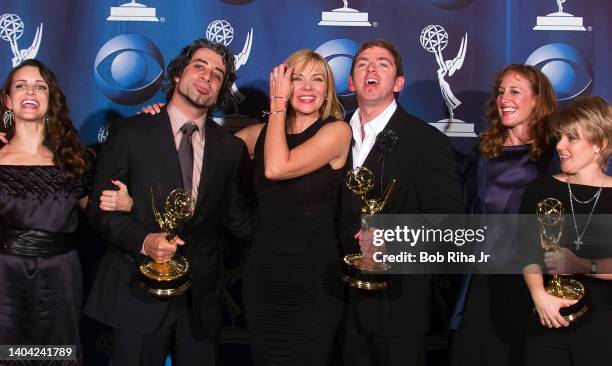 The cast and crew of the HBO series "Sex and the City" pose with their awards for 'Outstanding Comedy Series' at the 53rd Emmy Awards Show, November...