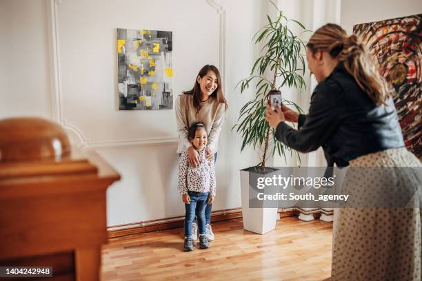 people in art gallery - family museum stock pictures, royalty-free photos & images