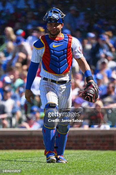 Catcher Willson Contreras of the Chicago Cubs walks off the field to the dugout during a game against the Atlanta Braves at Wrigley Field on June 18,...