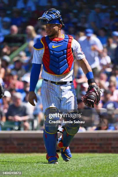 Catcher Willson Contreras of the Chicago Cubs walks off the field to the dugout during a game against the Atlanta Braves at Wrigley Field on June 18,...