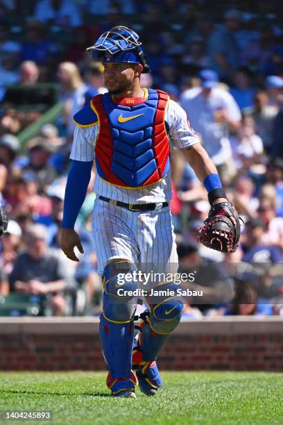 Catcher Willson Contreras of the Chicago Cubs walks off the field to the dugout during a game against the Atlanta Braves at Wrigley Field on June 18,...