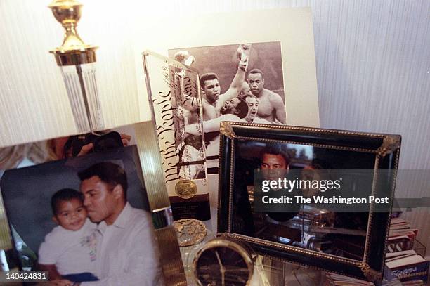 Day with Muhammad Ali on his farm in Berrien Springs, Michigan. Old photos surround him in his home and office. .