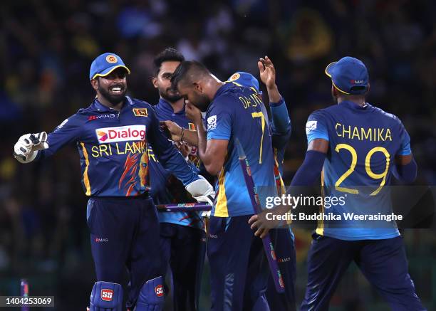 Dasun Shanaka of Sri Lankan captain, 2-R, celebrates with teammates after winning the match, lead 2-0 in the series during the 4th match in the ODI...