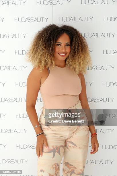 Amber Gill attends Huda Beauty FauxFilter Concealer launch Global Tour on June 21, 2022 in London, England.