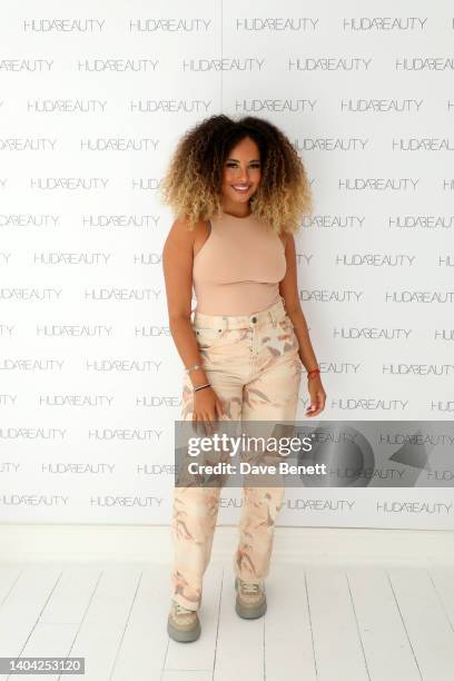 Amber Gill attends Huda Beauty FauxFilter Concealer launch Global Tour on June 21, 2022 in London, England.