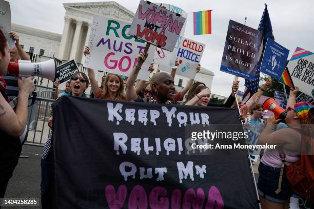 Pro-abortion rights activists demonstrates near an anti-abortion rights group outside of the U.S. Supreme Court Building on June 21, 2022 in...
