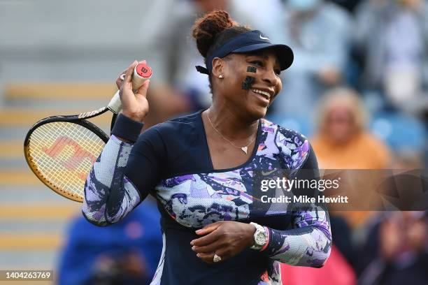 Serena Williams of United States of America laughs during their Women's Doubles Round One match against Marie Bouzkova of Czech Republic and Sara...