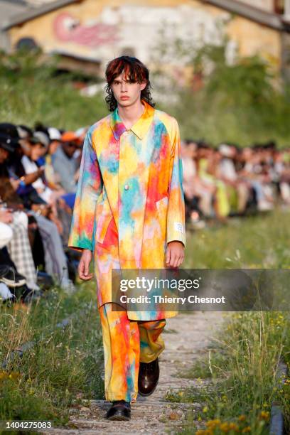 Model walks the runway during the Etudes Menswear Spring Summer 2023 show as part of Paris Fashion Week on June 21, 2022 in Paris, France.