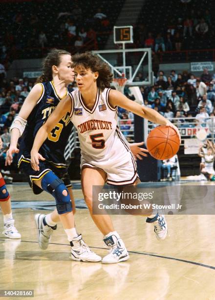 American basketball player Debbie Baer of the University of Connecticut drives past a defender in a game against Toledo, Gampel Pavilion, Storrs, CT,...