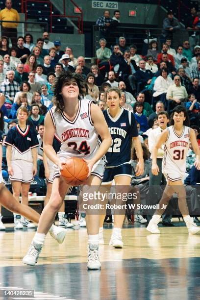 The University of Connecticut's Kerry Bascomb drives against Georgetown, Storrs, CT, 1990.