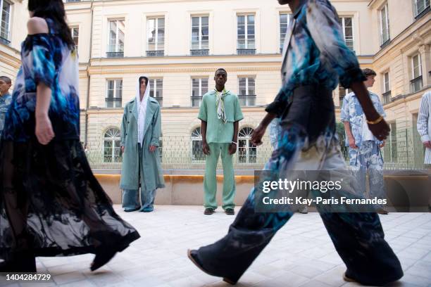 Models pose during the Taakk Menswear Spring Summer 2023 show as part of Paris Fashion Week on June 21, 2022 in Paris, France.
