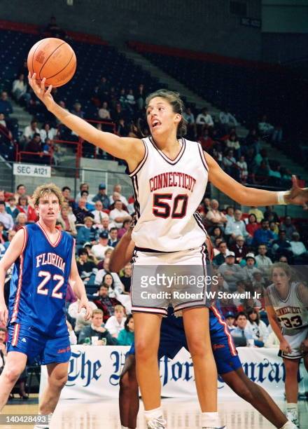 University of Connecticut's star player Rebecca Lobo rebounds the ball against the University of Florida, Gampel Pavilion, Storrs, CT, 1995.