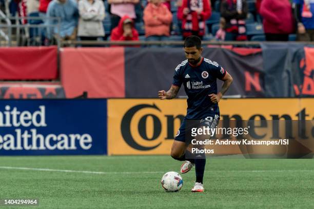 DeLaGarza of New England Revolution passes the ball during a game between Minnesota United FC and New England Revolution at Gillette Stadium on June...