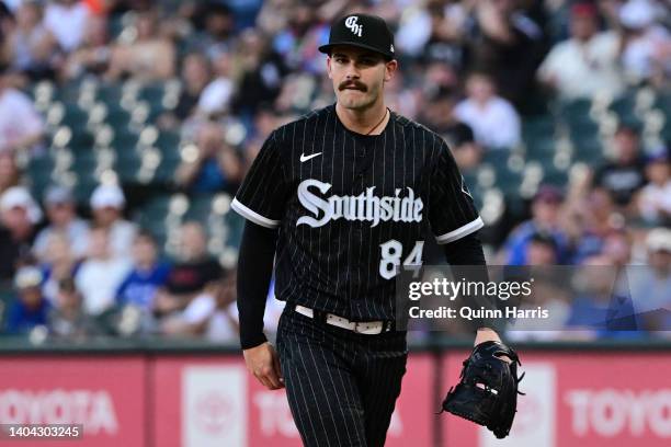 Starting pitcher Dylan Cease of the Chicago White Sox reacts after his 100th career strikeout in the first inning against Vladimir Guerrero Jr. Of...