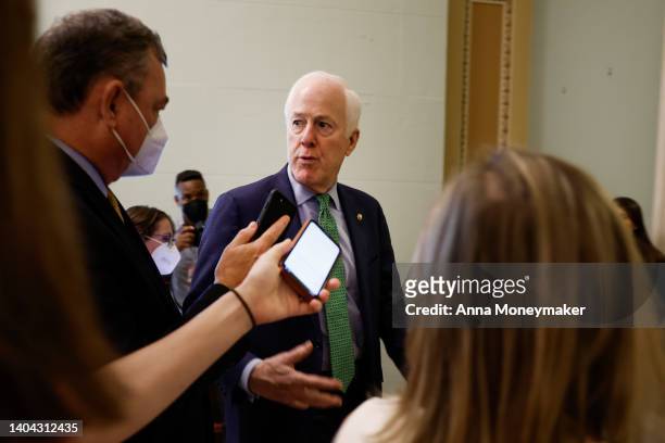 Sen. John Cornyn speaks to reporters as he walks to the Senate Chambers of the U.S. Capitol on June 21, 2022 in Washington, DC. The bipartisan group...