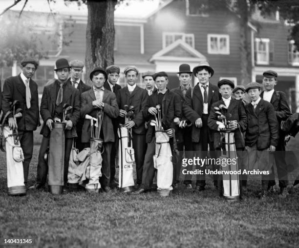 Golf caddies at the Baltusrol Golf Club in Springfield, New Jersey, circa 1900.