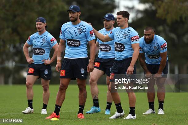 Jordan McLean and Victor Radley look on during a New South Wales Blues State of Origin training session at Hale School on June 22, 2022 in Perth,...