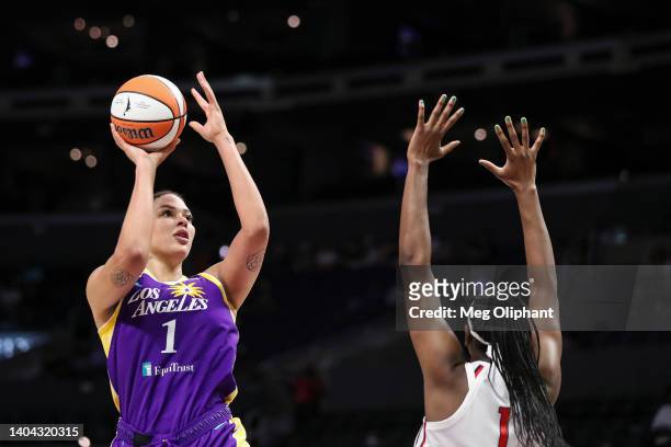 Liz Cambage of the Los Angeles Sparks shoots over Elizabeth Williams of the Washington Mystics in the first half at Crypto.com Arena on June 21, 2022...