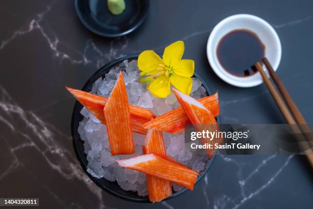 crab sticks on ice - crab stick stock pictures, royalty-free photos & images